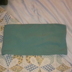 Sea foam green tube top that ties from the back.